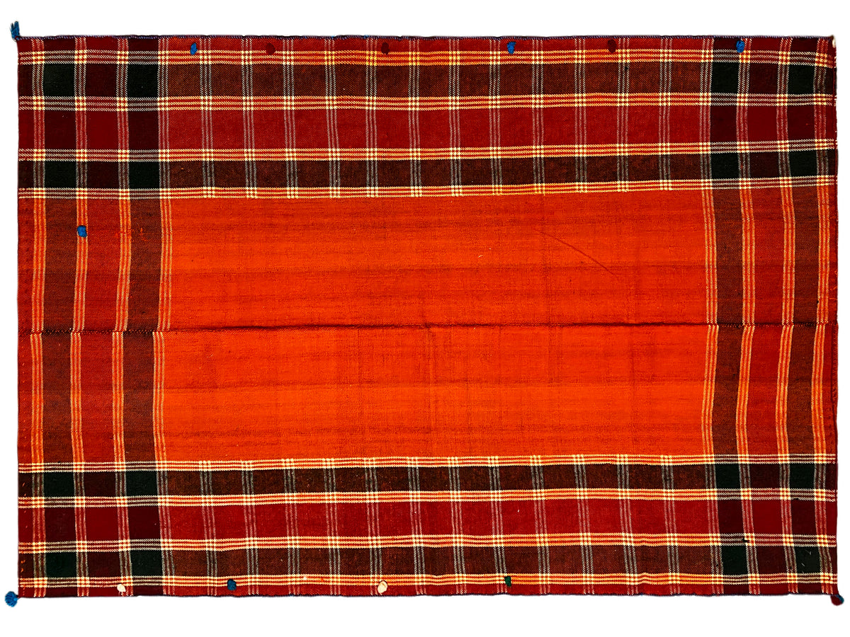 Tappeto Jajim, vista dall’alto: ampia fascia centrale rosso-arancio con cornice a quadri