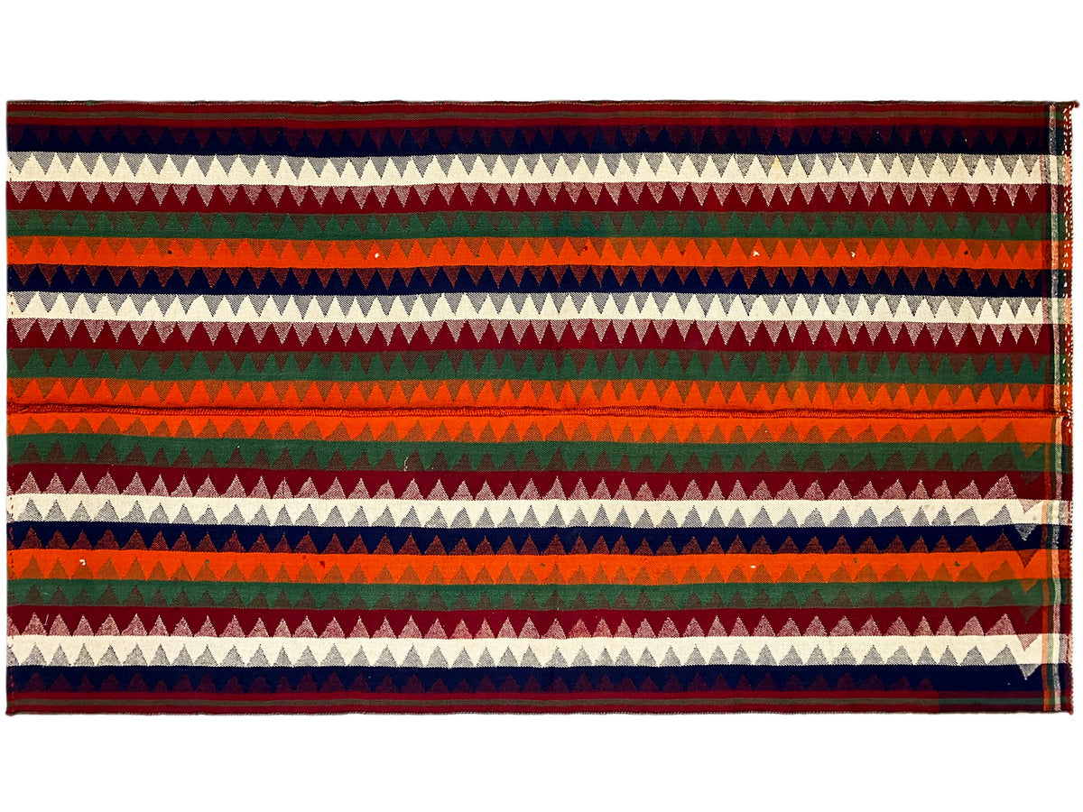 Tappeto Jajim, vista trasversale: bande orizzontali a zigzag e a strisce in rosso, verde, blu e crema