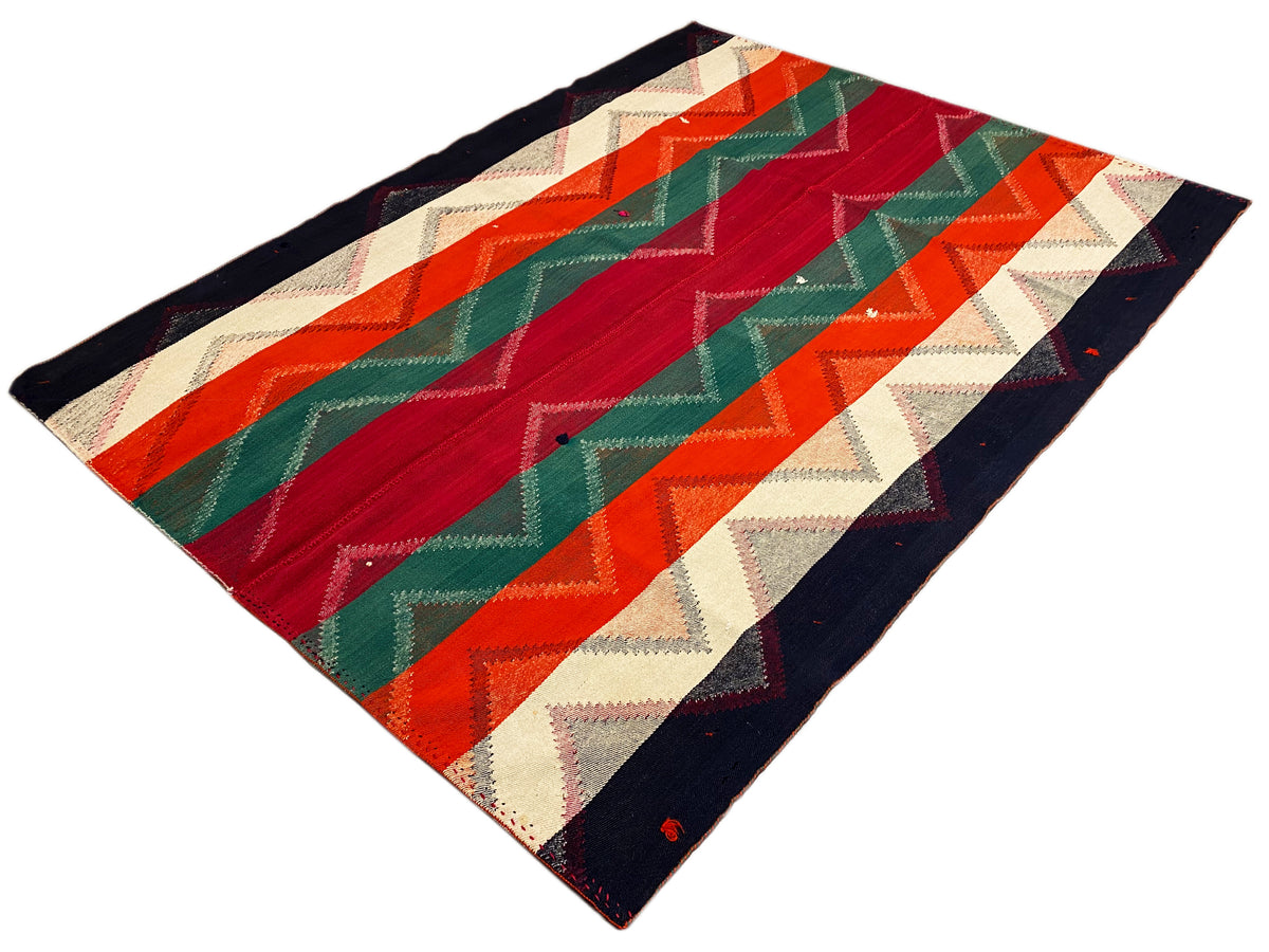 Tappeto con motivo a rombi e strisce a zigzag in rosso, verde, arancione, beige e blu scuro