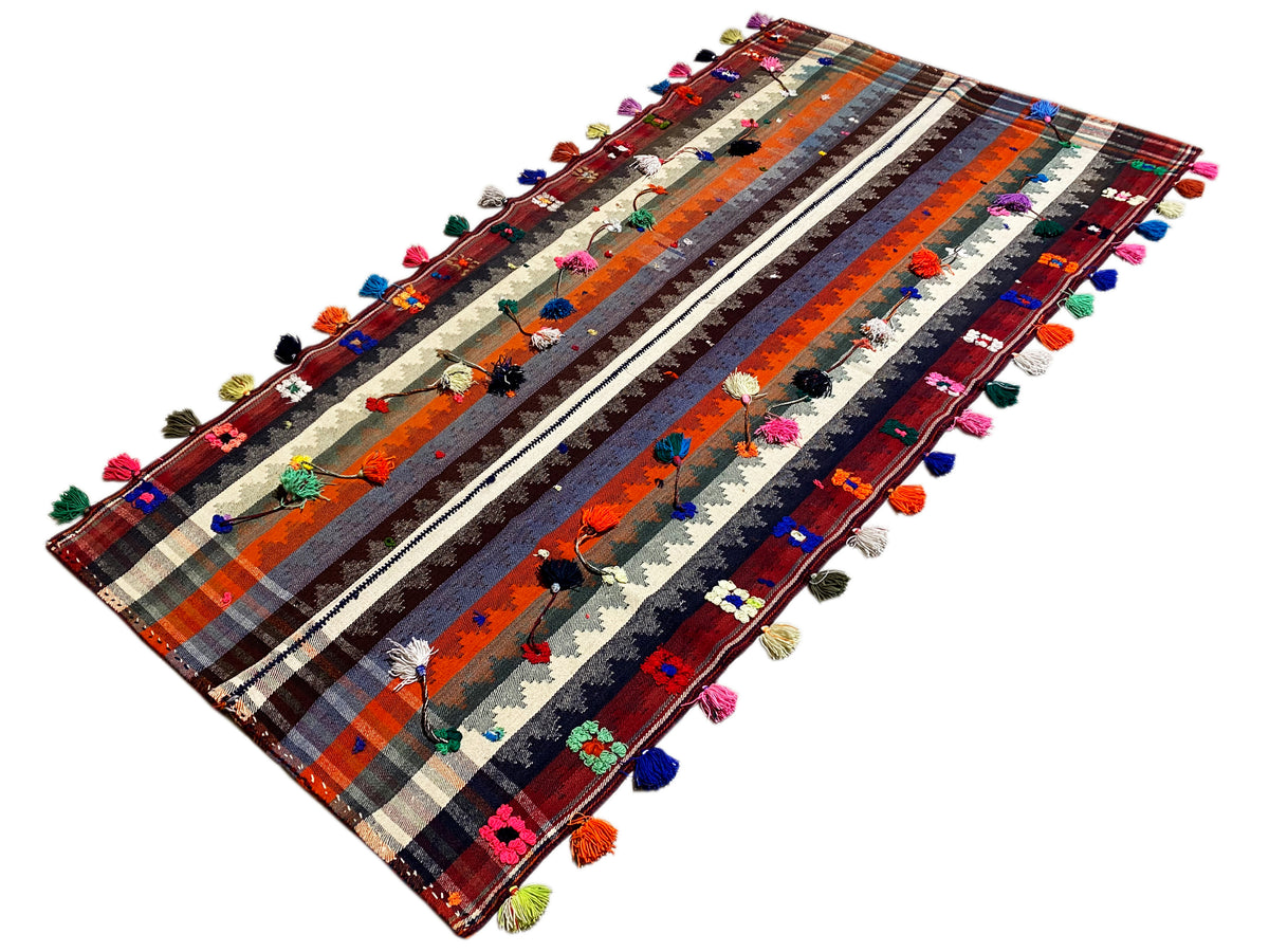 Tappeto Jajim inclinato con motivo a strisce e nappe multicolori