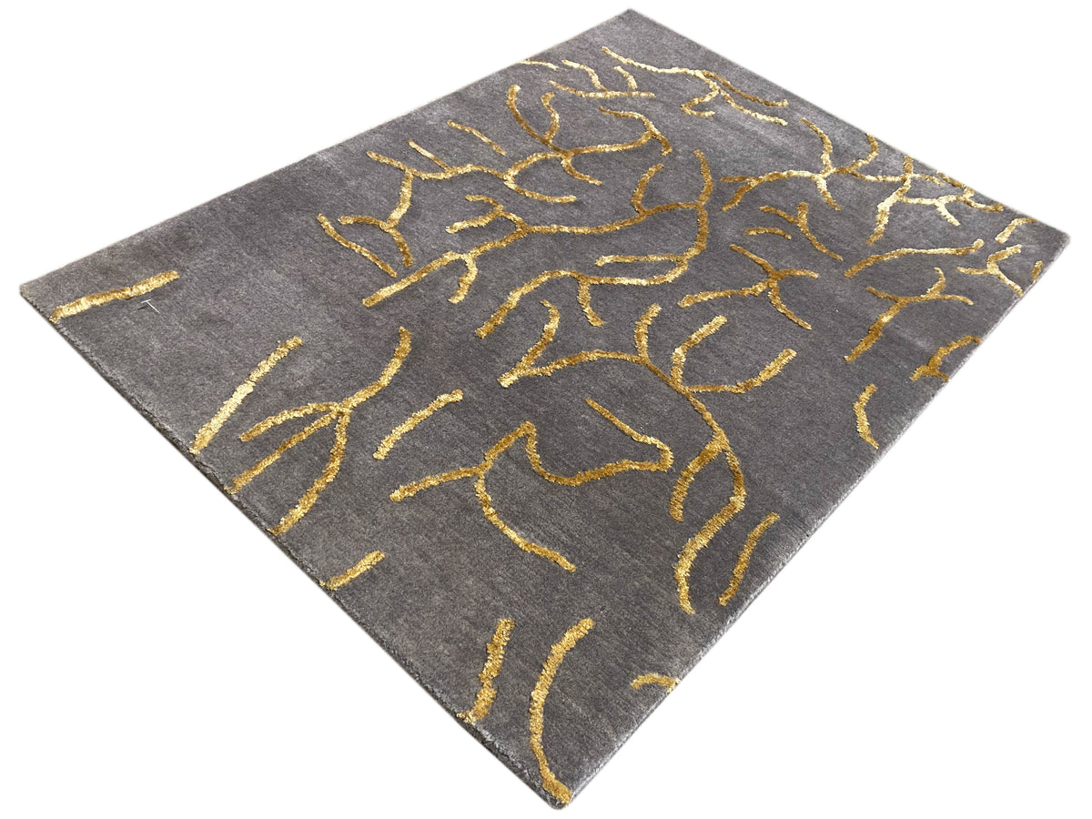 Designer-Teppich 91x62 cm, graue Teppichfläche mit gelbem abstraktem Muster