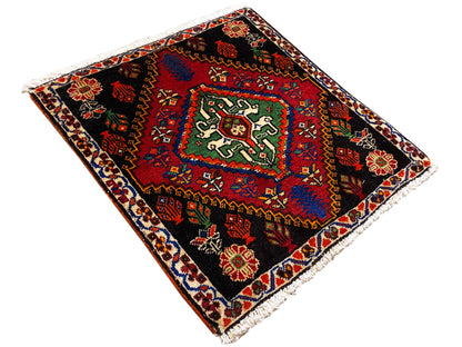 Tappeto Poshti 56x56 cm, posato in diagonale, motivi geometrici in rosso, verde e blu
