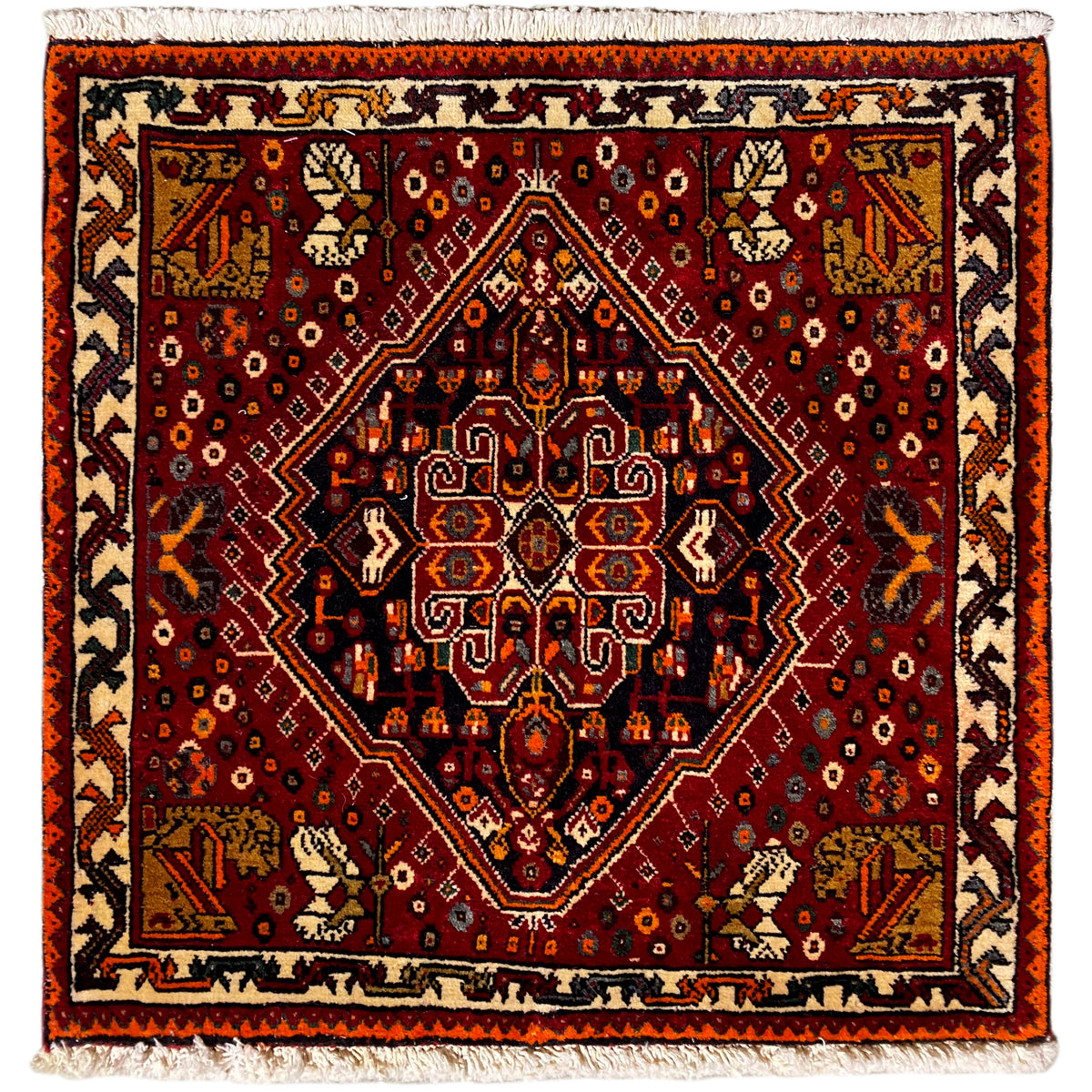 Tappeto Poshti 60x60 cm, motivo rosso con bordo arancione e frange