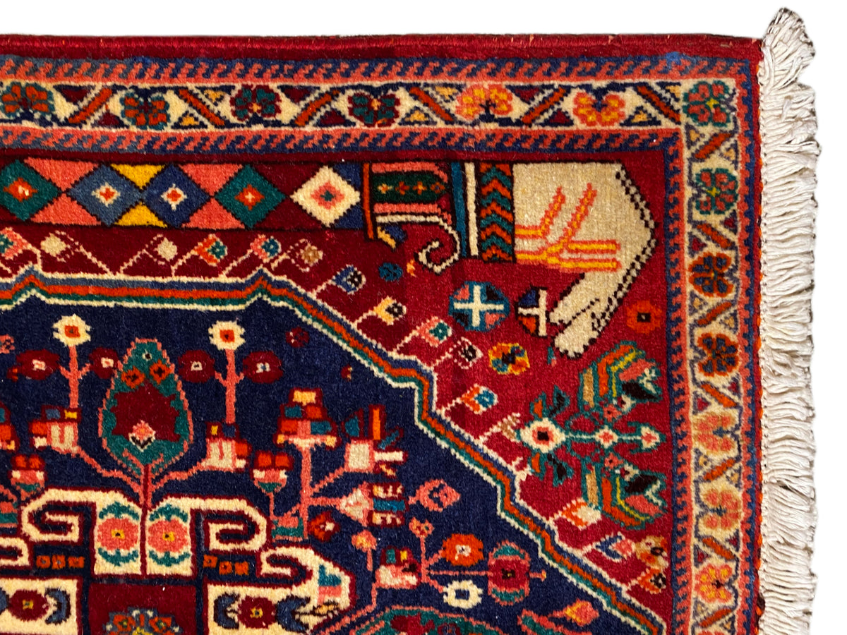 Tappeto Poshti 64x64 cm, primo piano del bordo con motivi geometrici, rosso-blu, frange