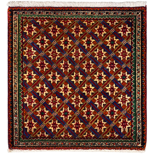 Tappeto Poshti 62x52 cm con motivo geometrico, multicolore e frange.