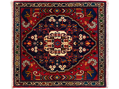 Tappeto con medaglione quadrato, motivo blu-rosso e accenti color crema, bordo con frange