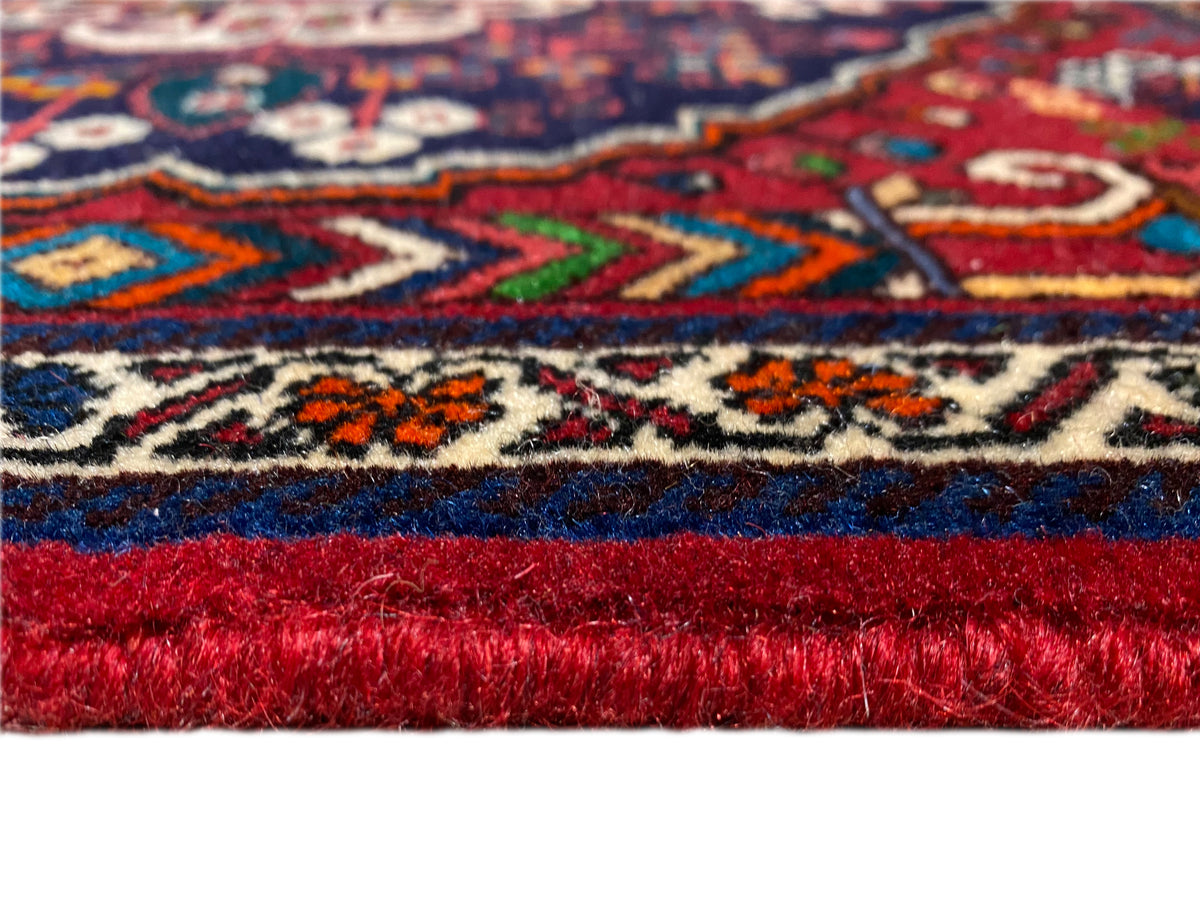 Bordura di tappeto con motivi a zigzag e a linee, frange corte, rosso-blu