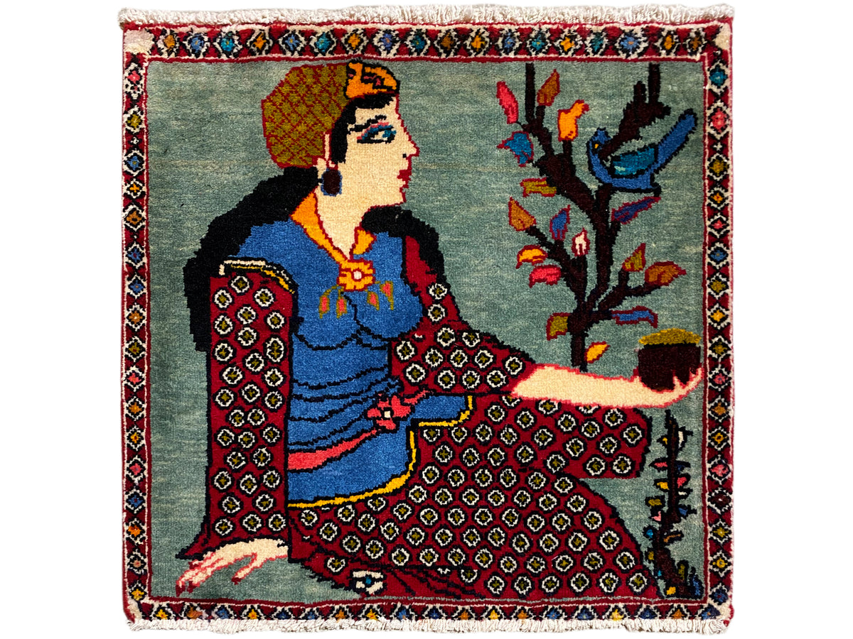 Tappeto Poshti 68x63 cm con figura distesa e albero sullo sfondo, bordura, frange
