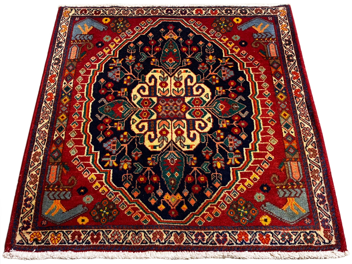 Tappeto quadrato 67x60 cm con motivo centrato in blu scuro, rosso e giallo