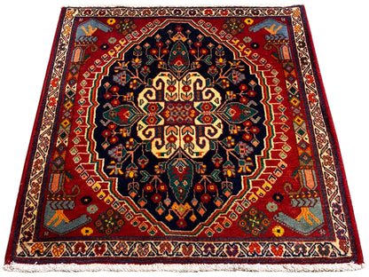 Tappeto quadrato 67x60 cm con motivo centrato in blu scuro, rosso e giallo