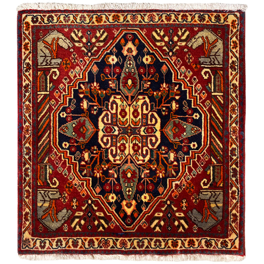 Tappeto 65x59 cm con medaglione rosso e blu, motivi ornamentali e frange