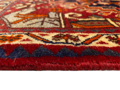 Tappeto 65x59 cm, vista ravvicinata: pelo rosso, bordo perimetrale e frange corte