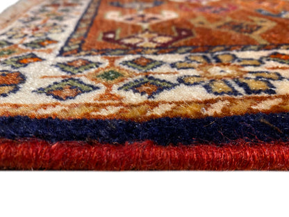 Tappeto Poshti 60x55 cm, primo piano: frange e motivo tessuto multicolore sul bordo