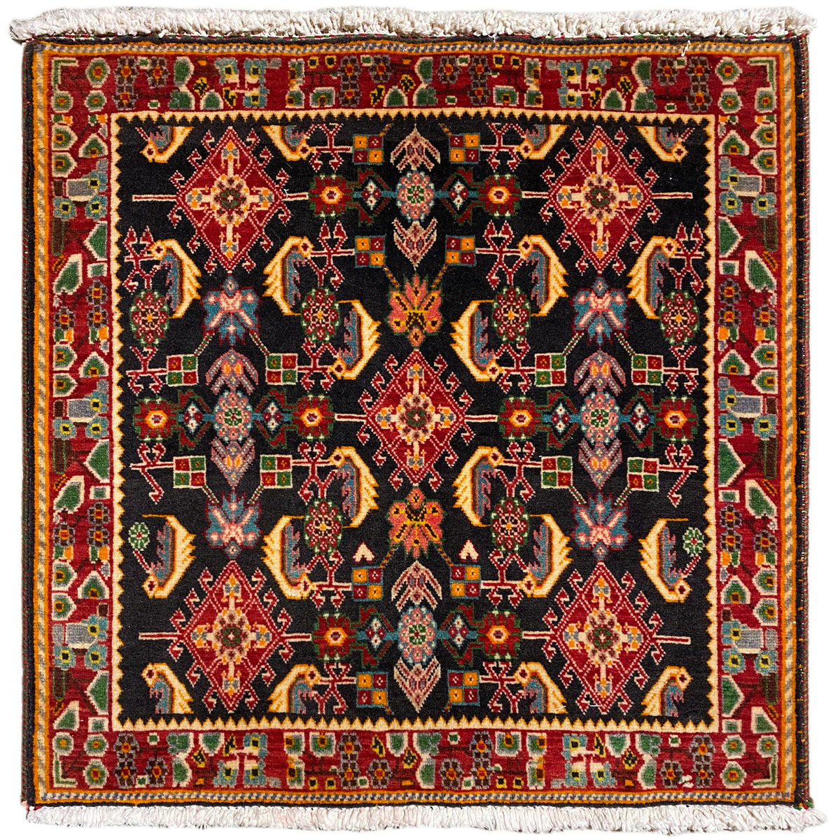 Tappeto Poshti con motivo geometrico: nero, tonalità di rosso, giallo e verde, 66x65 cm