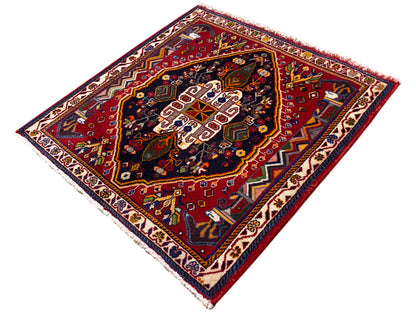 Tappeto Poshti (67×67 cm) in diagonale: bordura marrone rossiccia, campo blu con ornamenti