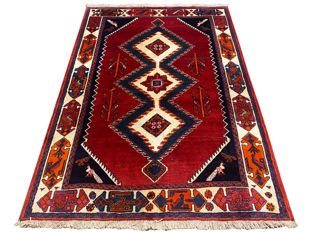 Shiraz Qashqai-Teppich in Rot und Dunkelblau mit geometrischen Rauten und Fransen