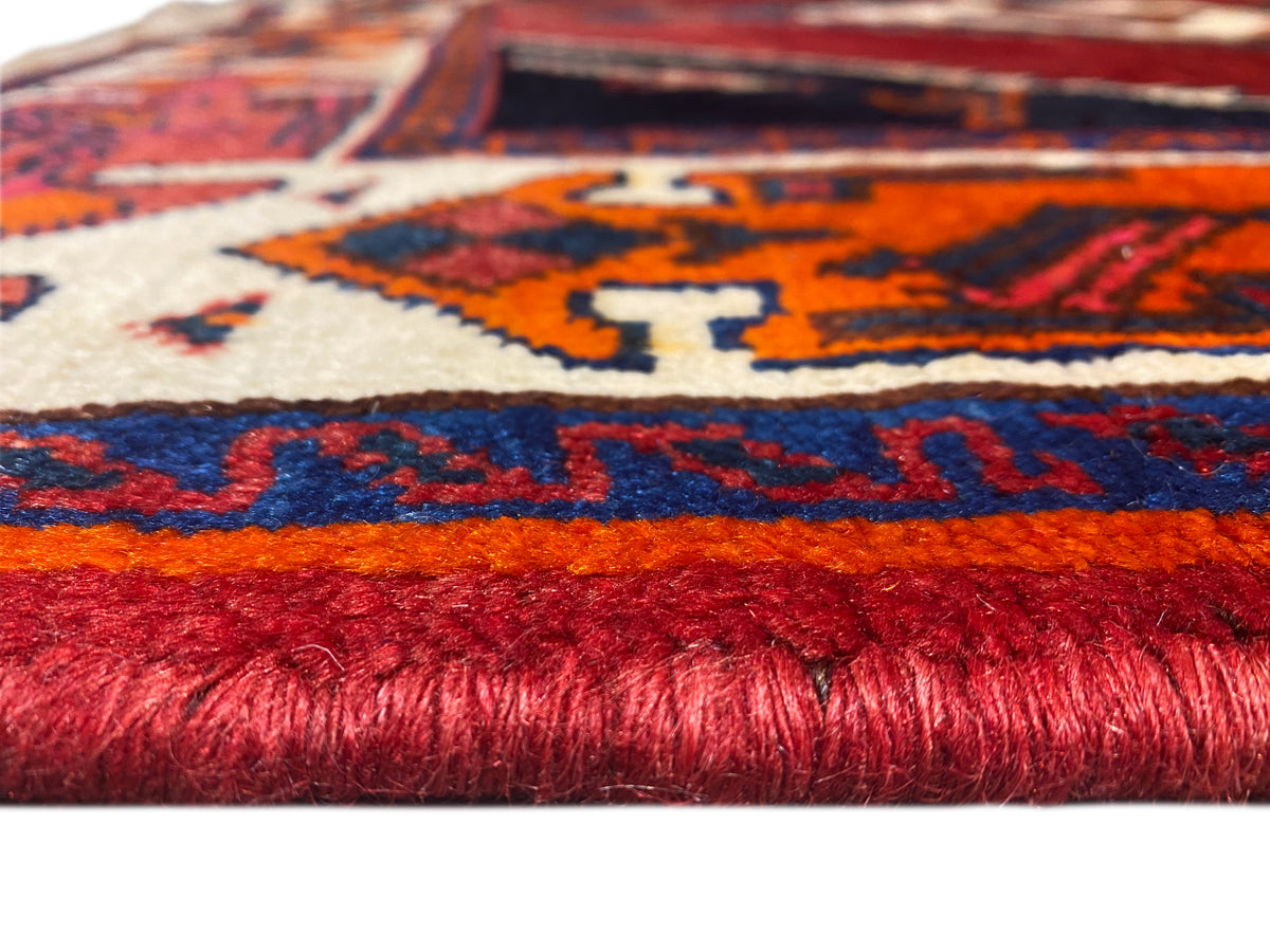 Shiraz Qashqai-Teppich Detail mit roten Florhöhe und geometrischen Mustern, mit Fransen