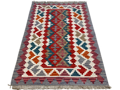 Mehrfarbiger Kelim Teppich im Boho Ethno Stil mit Medaillonmotiv